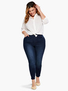 Dark wash slim ankle jeans, high-waisted with a close fit. Subtle fading visible on thighs.