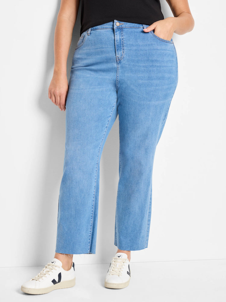Light blue straight ankle jeans with button fly, front pockets, and raw, frayed ankle hems.