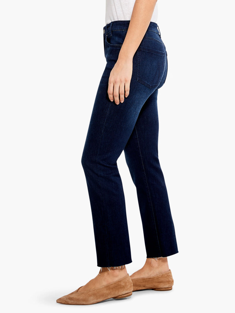 Dark blue straight ankle jeans, featuring a raw, frayed hem.