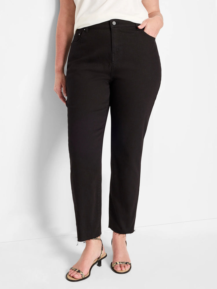 Black straight ankle jeans with frayed hems.