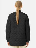 Black quilted jacket, knit collar, diamond pattern.  Back view.