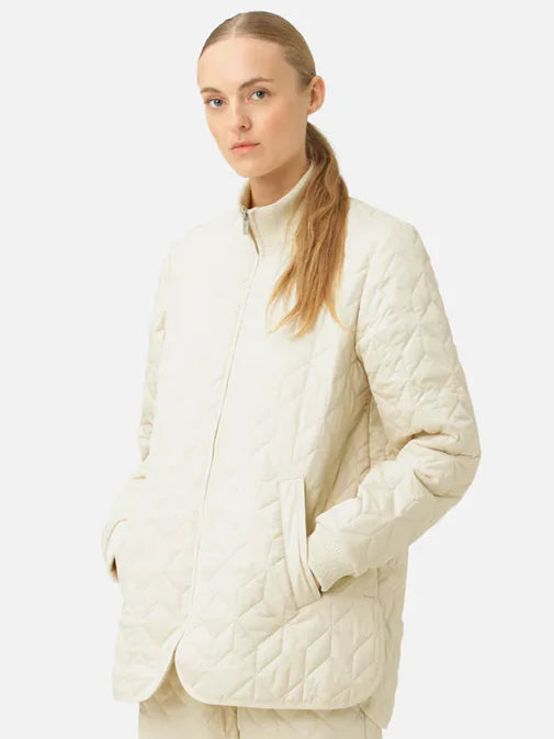 Off-white quilted jacket with knit collar and zip front.  Diamond quilting pattern.