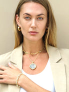 Gold and silver two-toned chain bracelet with oval links.