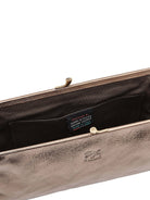 Bronze metallic leather clutch, dark brown fabric interior, gold-tone clasp.  Small interior pocket visible.