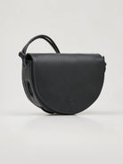 Black half-moon shaped leather crossbody bag with knotted shoulder strap.  Small logo on front.