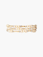 Triple-wrap bracelet: champagne pearls, gold, and gray beads.