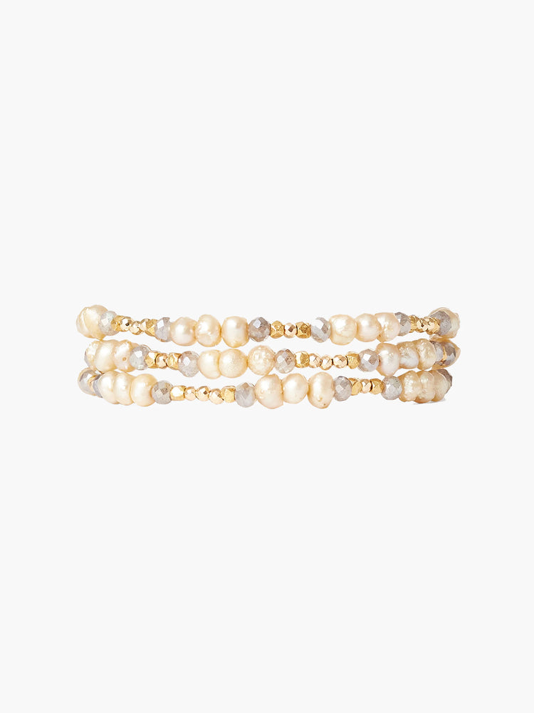 Triple-wrap bracelet: champagne pearls, gold, and gray beads.