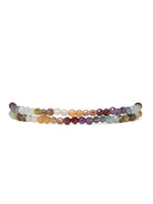 Multicolored beaded wrap bracelet.  Features small, faceted beads in teal, purple, orange, brown, and green tones. ...