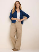 Navy terry bubble jacket. Features a collar, front buttons, and a relaxed fit.
