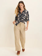 Dark blue and off-white shibori crinkle button-down shirt.