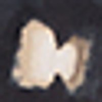 Creamy beige, matte, with a subtle, textured, uneven surface.