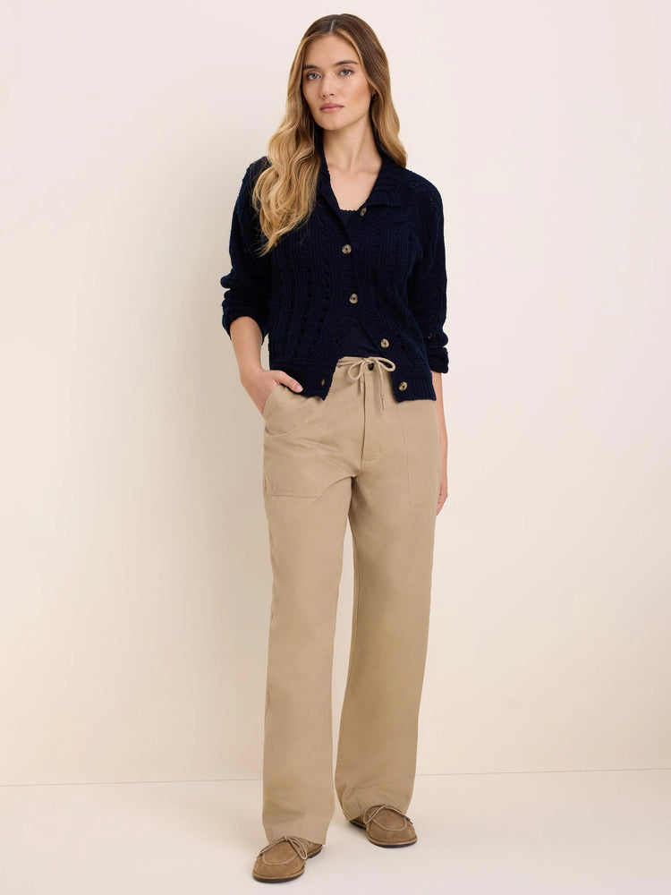 Khaki drawstring twill pants with a tied waist, front patch pockets, and a relaxed, wide-leg fit.