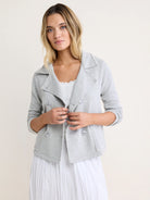 Light grey French terry double-breasted jacket with raw edges, a lapel collar, and light buttons.