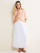 Pale pink mesh sweater. Features a polo collar, short sleeves, and a visible open knit texture.