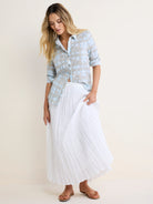 Light blue & gray/white shibori tie-dye cotton shirt. Crinkled texture, button-up with sleeves rolled.