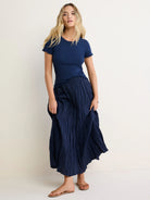Dark blue crinkle cotton skirt. Long, flowing, with visible textured pleats.