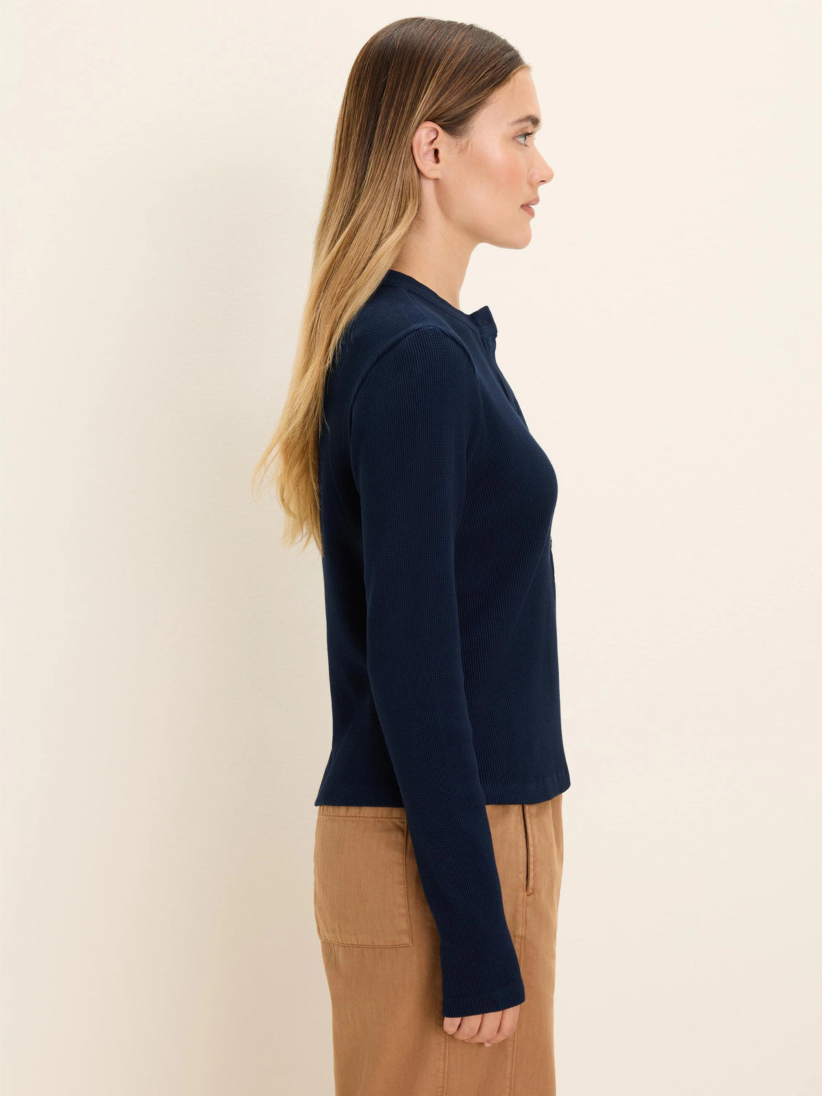 Dark navy blue waffle knit long-sleeve thermal henley with a two-button placket, shown on a model.