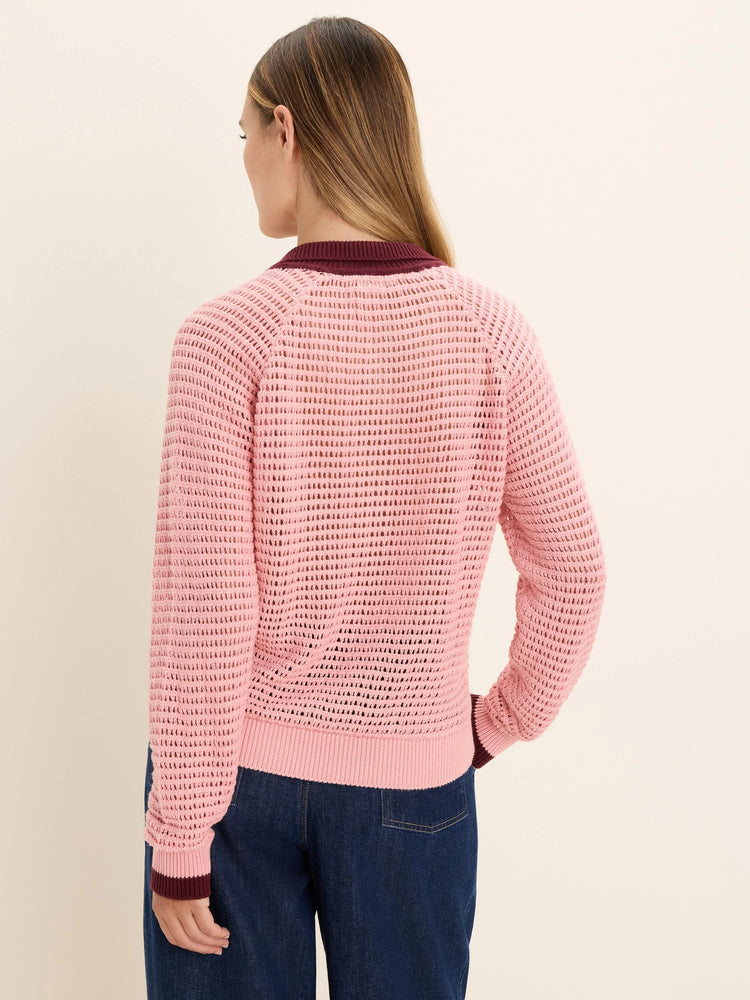 Pink mesh long-sleeve polo sweater with dark red collar & cuffs. Visible open knit texture.