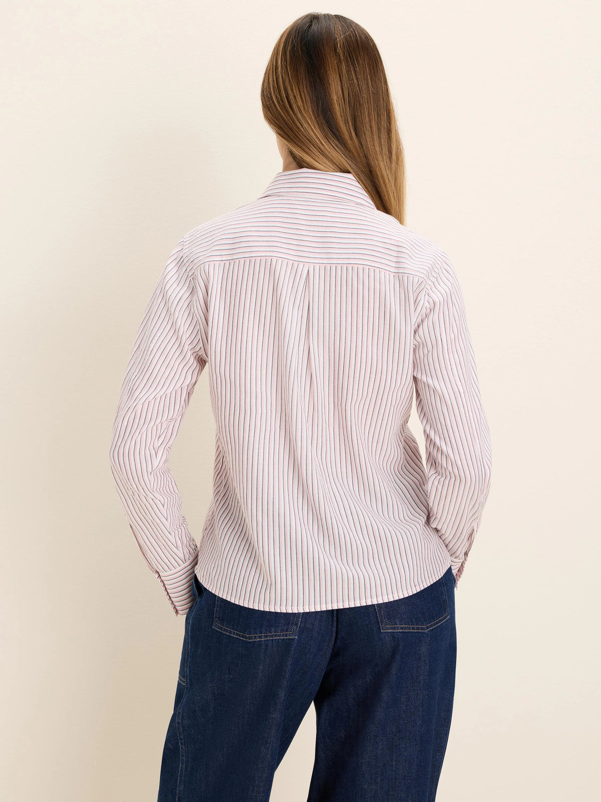Off-white shirt with thin light pink and dark grey vertical stripes, shown from the back.