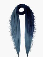 Dip-dye cashmere and silk scarf.  Ombre effect, light to dark blue shades.  Frayed edges.