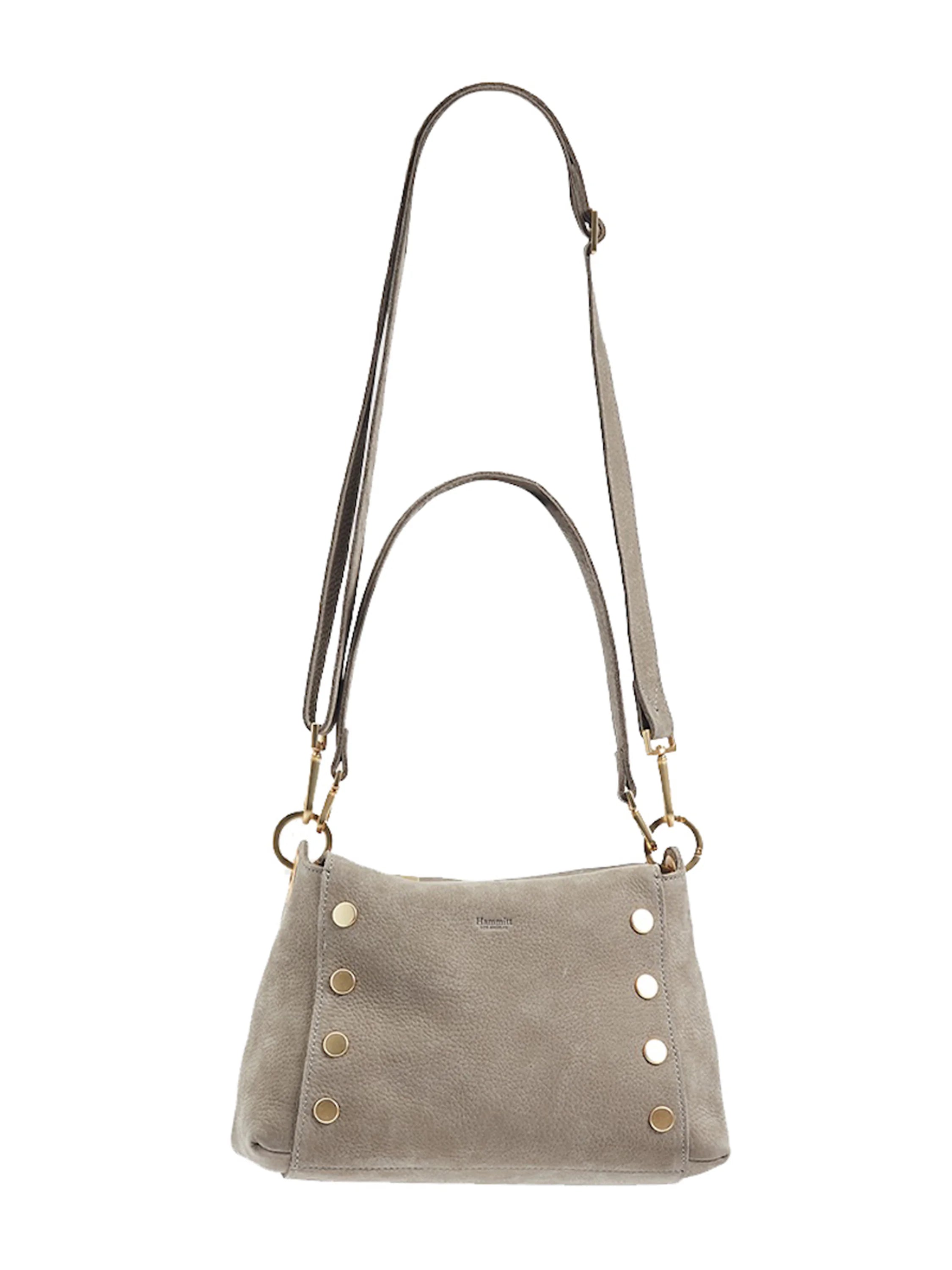 Gray-taupe textured leather shoulder bag with gold hardware. Features a top handle, long adjustable strap, and studs on...