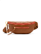 Brown pebbled leather crossbody bag with red zippers and gold hardware. Features an adjustable brown strap.