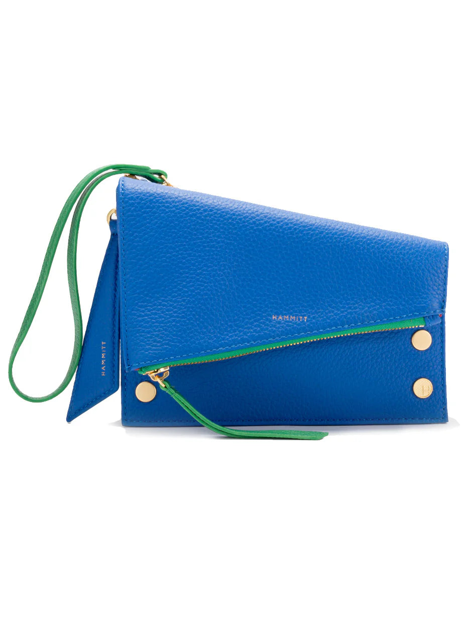 Blue pebbled leather clutch with asymmetrical flap, diagonal green zipper, green strap, and gold hardware.