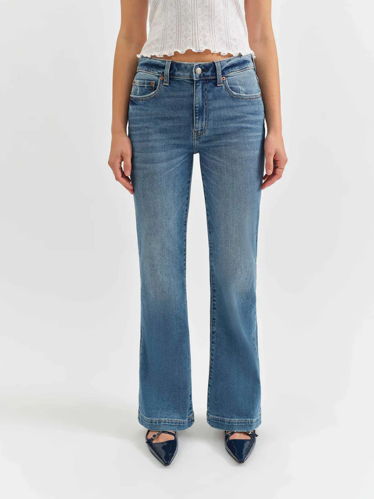 Medium blue mid-rise jeans, flared from the knee, with subtle fading on the thighs.
