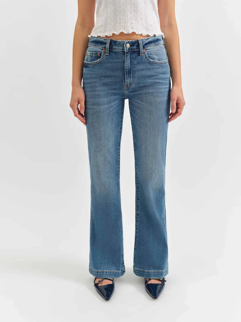 Medium blue mid-rise jeans, flared from the knee, with subtle fading on the thighs.