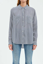 Navy & white striped button-up top with long sleeves, collar, and two chest pockets.