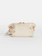 Off-white leather crossbody clutch with gold zipper and studs.  Small, with a detachable strap.