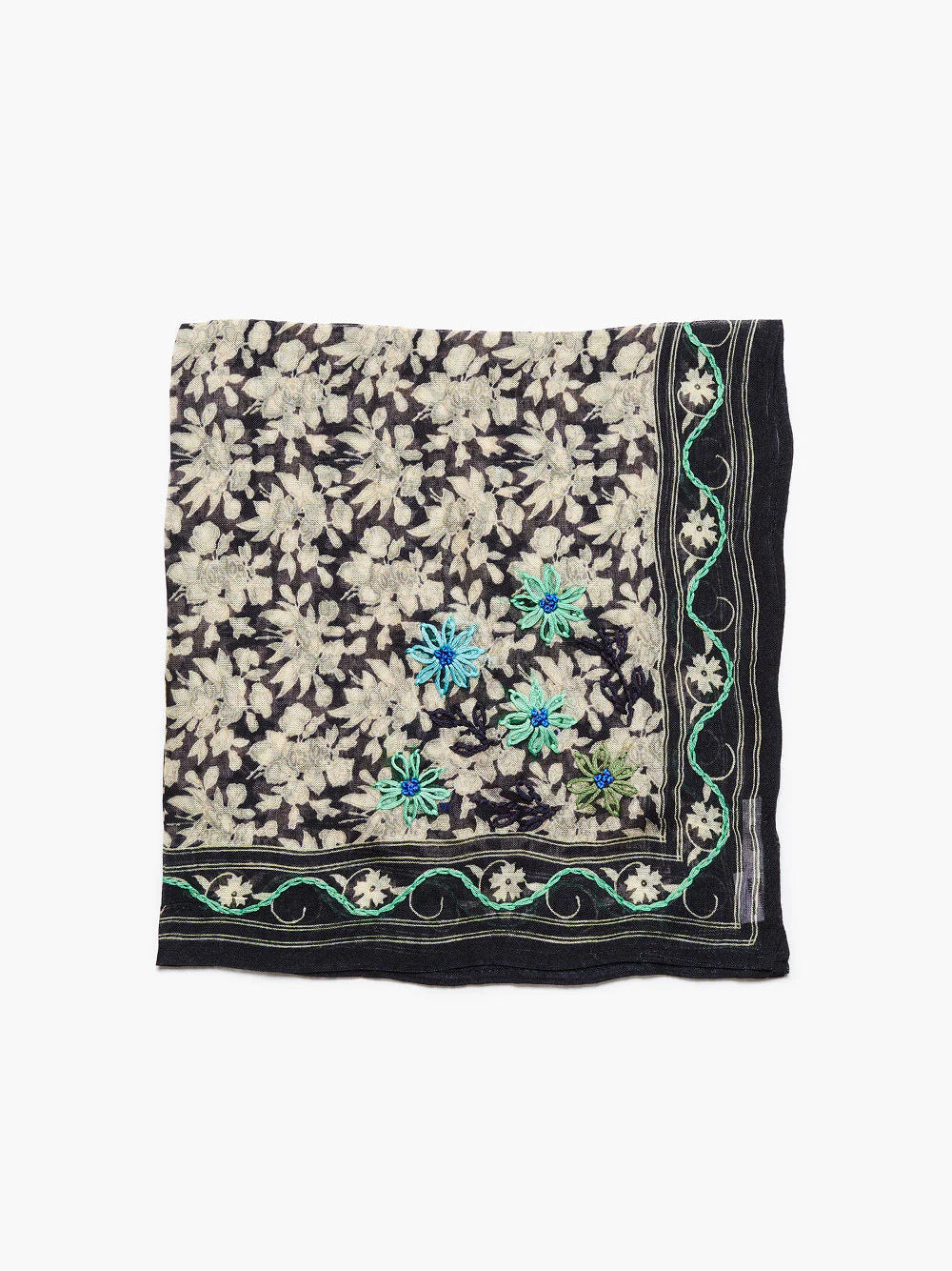 Dark navy bandana with light grey floral print. Features embroidered blue/green flowers & a light green wavy border.