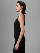 Black sleeveless knit scuba high neck tank with a relaxed fit.