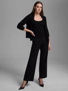 Black, scoop-neck cashmere tank top, fitted, on a model.