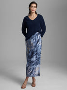 Long silk slip skirt with blue, grey, & tan abstract swirl pattern, visible drawstring waist.