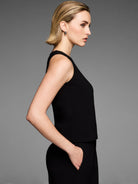 Black knit scuba high neck sleeveless tank with a relaxed fit.