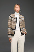 Beige, black, & white patterned knit jacket with geometric designs. Features smooth black trim & fringe along the open front.