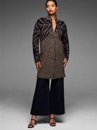 Brown & navy tufted double knit coat, abstract pattern sleeves, stand collar, 3 buttons.