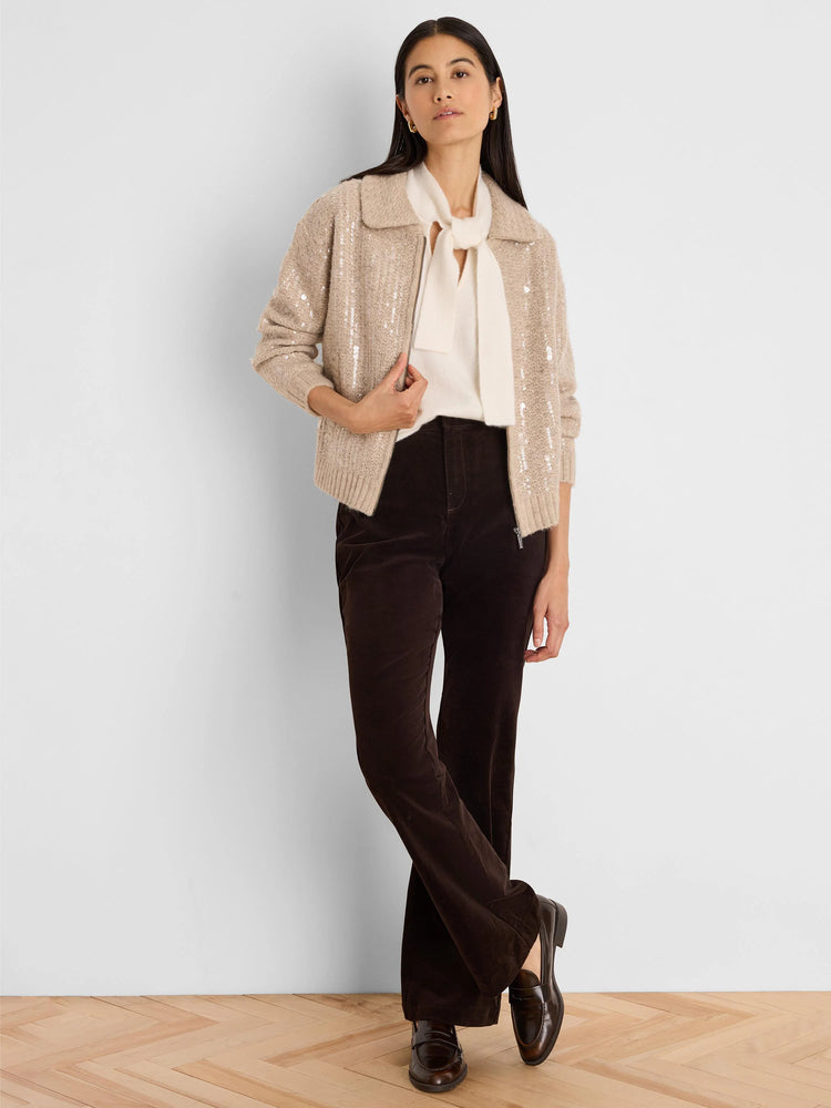 Cream tank top with a large bow neck, formed by long, soft ties.