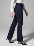 Dark wash bootcut jeans with a dark navy ribbon stripe down the side.