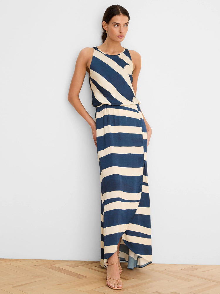 Navy and cream striped sleeveless maxi dress with a blouson waist and wrap skirt.