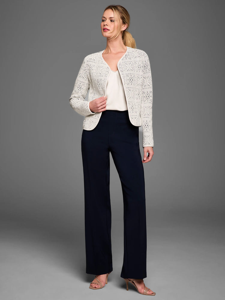 Off-white tapestry knit jacket with intricate geometric patterns and an open front.