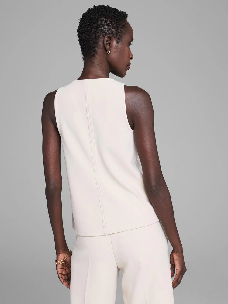 Cream scuba knit tank top, sleeveless, viewed from the back, featuring two distinct vertical seams down the center.