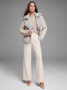 Beige, gray, and white floral knit sweater.  Asymmetrical zipper, gray collar.