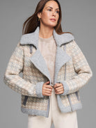 Textured knit jacket, cream, tan, & light grey houndstooth pattern. Grey moto collar, cuffs, and asymmetrical zipper.