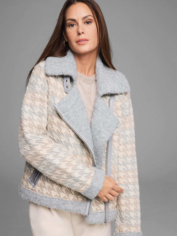 Houndstooth knit jacket: cream, tan, and light grey pattern. Fuzzy grey collar, lapels, & hem with an asymmetrical zipper.