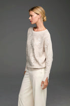 Light beige relaxed-fit crew neck sweater with an all-over silver floral sequin and embroidery pattern.