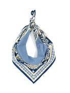 Cream, dark blue, and light blue bohemian bandana. Features floral motifs and scalloped borders, tied at the top.
