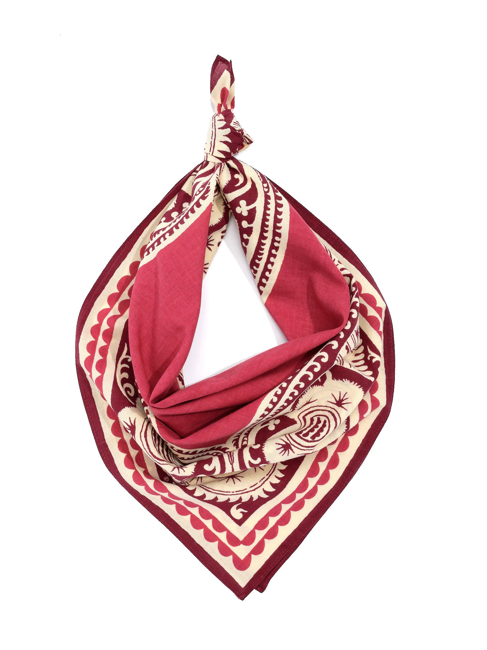 Maroon and cream bandana, folded and knotted, featuring intricate paisley and scalloped patterns in dark and lighter reds.
