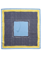 Square bandana: light blue center, navy/white polka dot field, bordered by white, yellow, & light blue stripes.